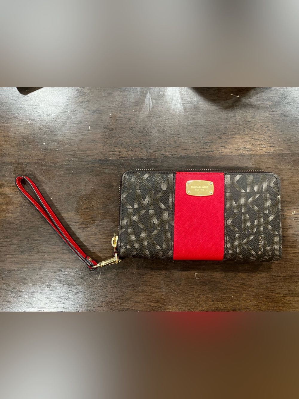 Michael Kors Brown Signature Wristlet with Red Accent